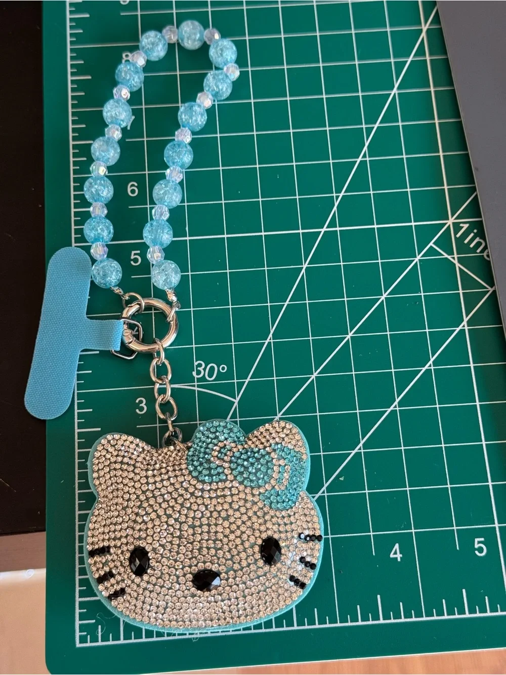 Rhinestone HK Kitty Cartoon Face Phone Charm Wristlet Strap - Light Blue NWOT